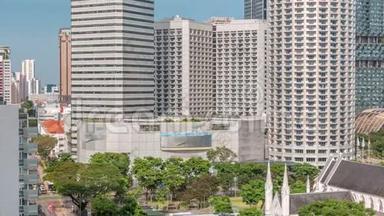 圣安德鲁大教堂附近的摩天大楼`空中时间。 这是新加坡的一座圣公会大教堂，`新加坡